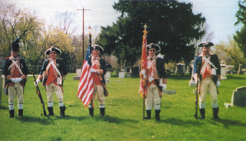 Re-enactors and a grave site. Photo by Peggy Gleich.