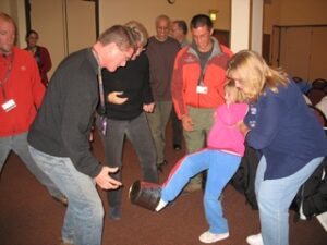 Mark Birdseye, formerly of the program staff at YMCA of the Rockies, Snow Mountain Ranch, teaching a "minute to win it" icebreaker at Family Reunion University.