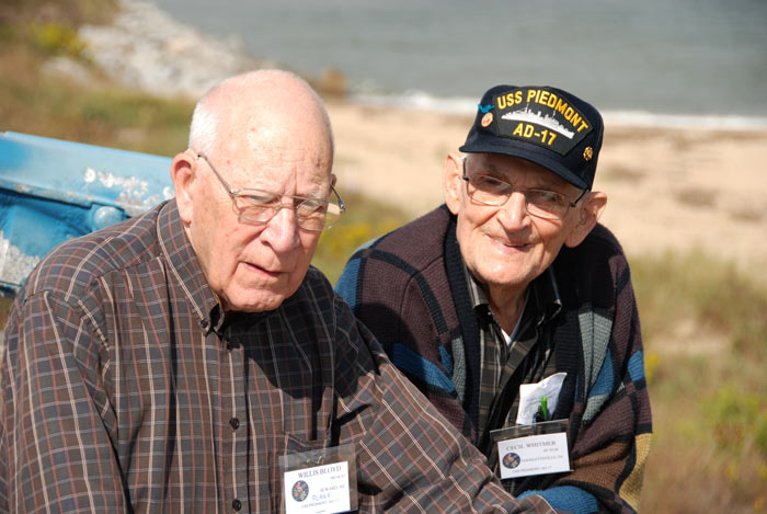 Two PLANK Sailors (members of the original crew assigned to the Piedmont at commissioning in 1944 at the Tampa Shipyards): (left) Willis Bloyd, Seward, Nebraska (93, aboard 1944-45) and Cecil Whitmer, Goodlettsville, Tennessee (94, aboard 1943-46). Whitmer was assigned before commissioning and was aboard for the "shakedown" cruise.