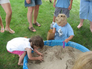 Bury wrapped candies and coins in sand for happy play.